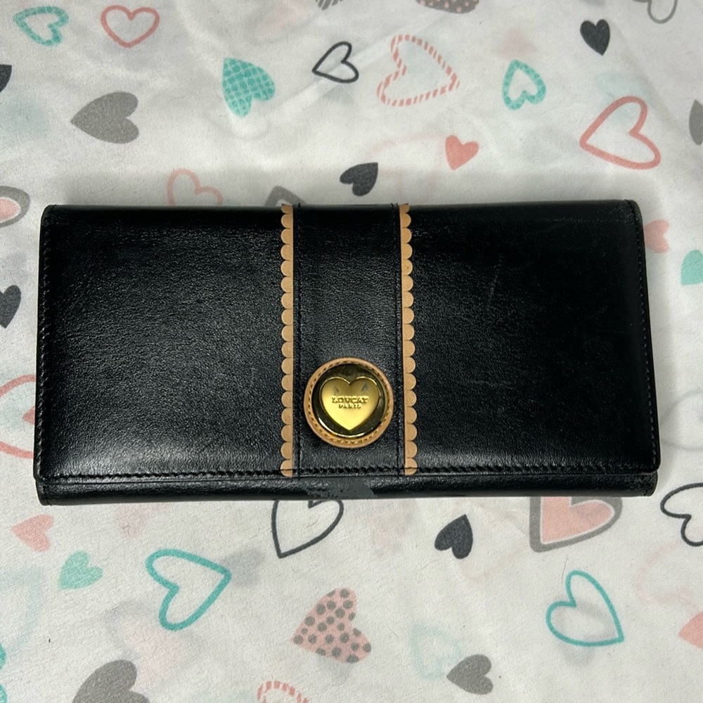 LOVCAT black leather wallet. Holds 10 cards. Gold heart in front.